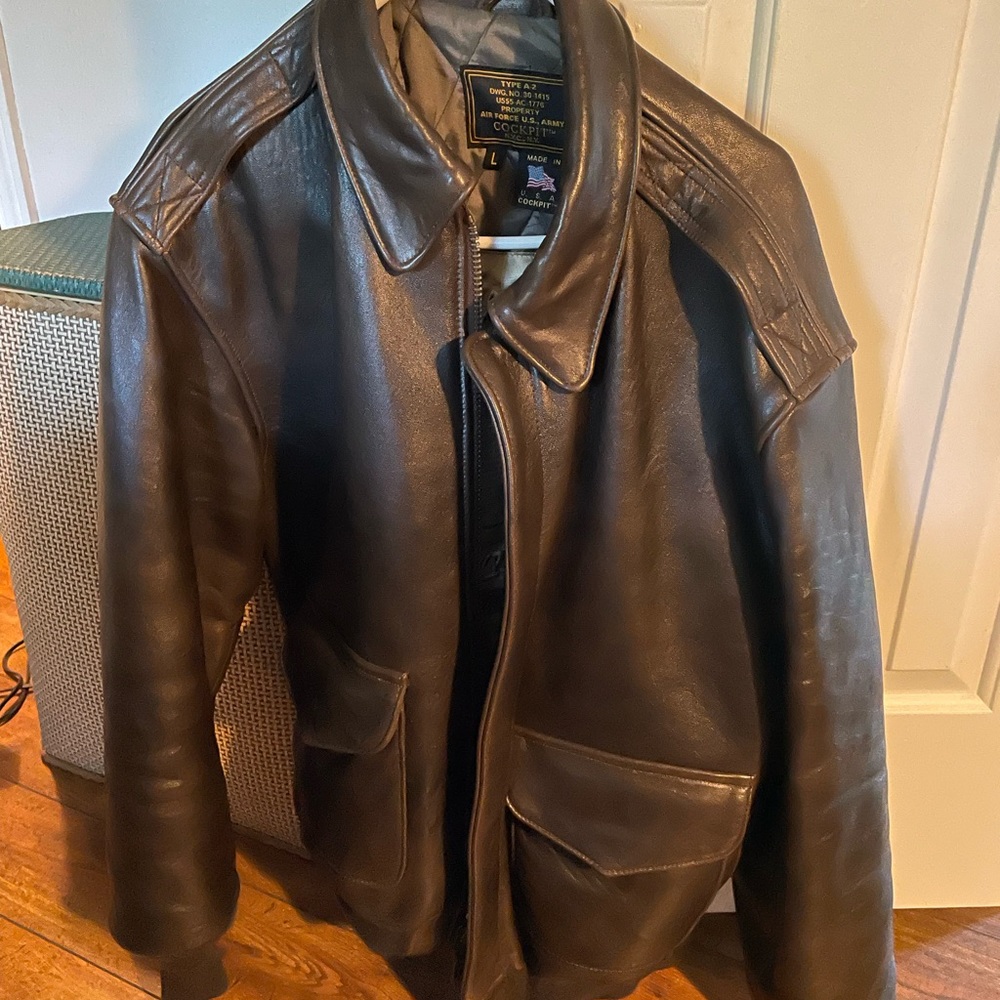 New, worn 3-4 times. Brand new condition. Heavy leather flight jacket. Very nice